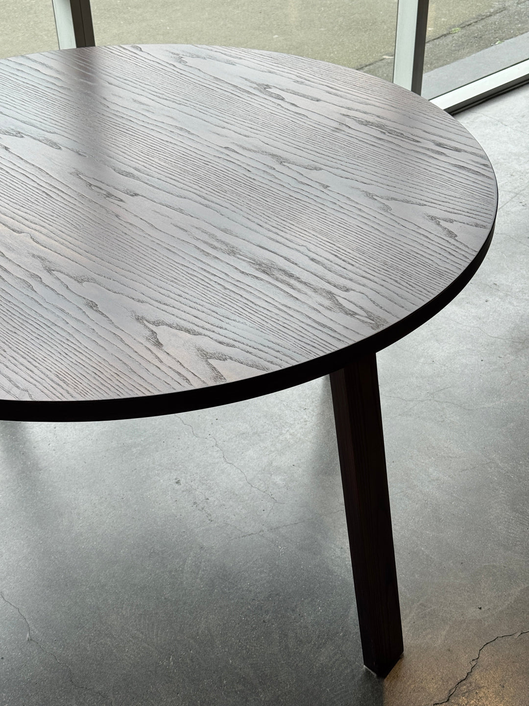 Bach 1.2m Round Table - Dark Walnut - Ex Showroom Model