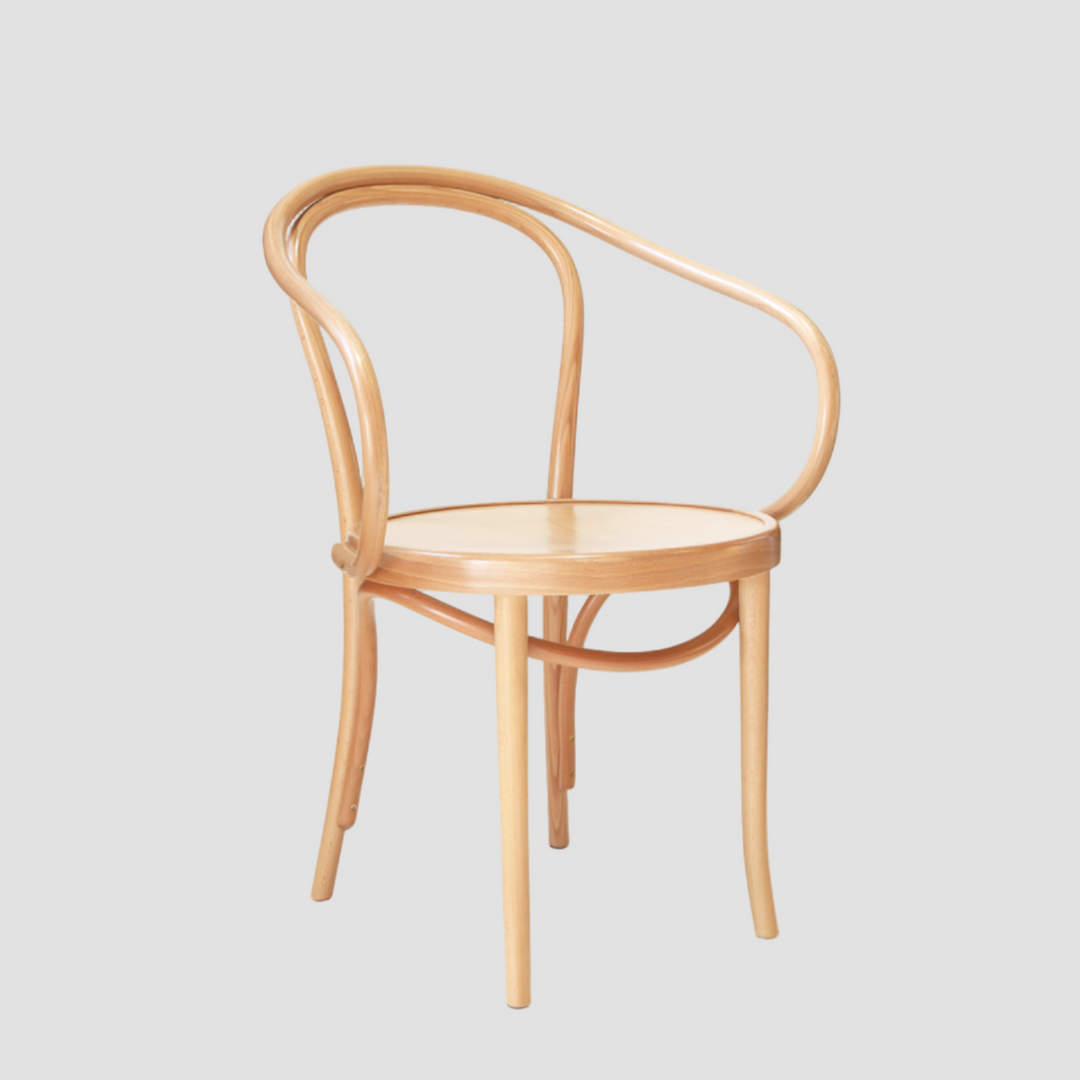 Wooden chair with curved armrests on a light gray background