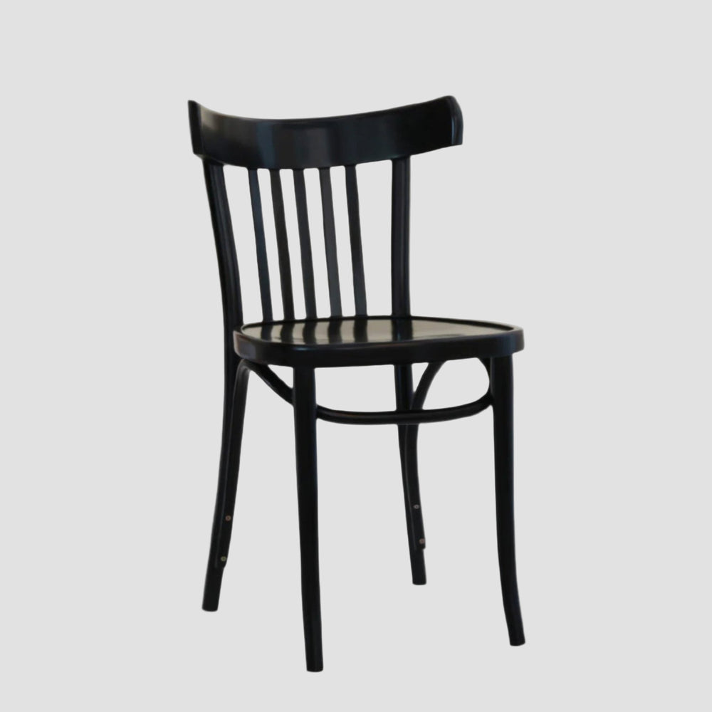 black classic bistro chair with curved backrest and vertical slats on a light grey background