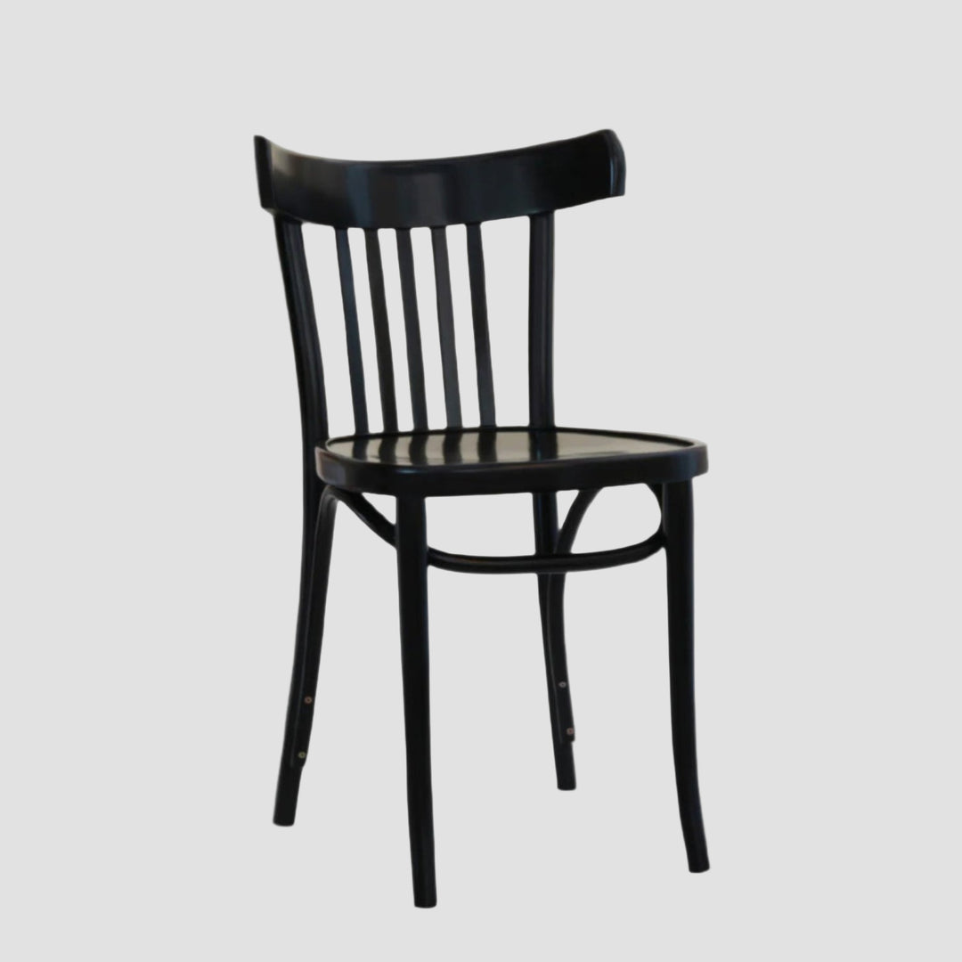 black classic bistro chair with curved backrest and vertical slats on a light grey background