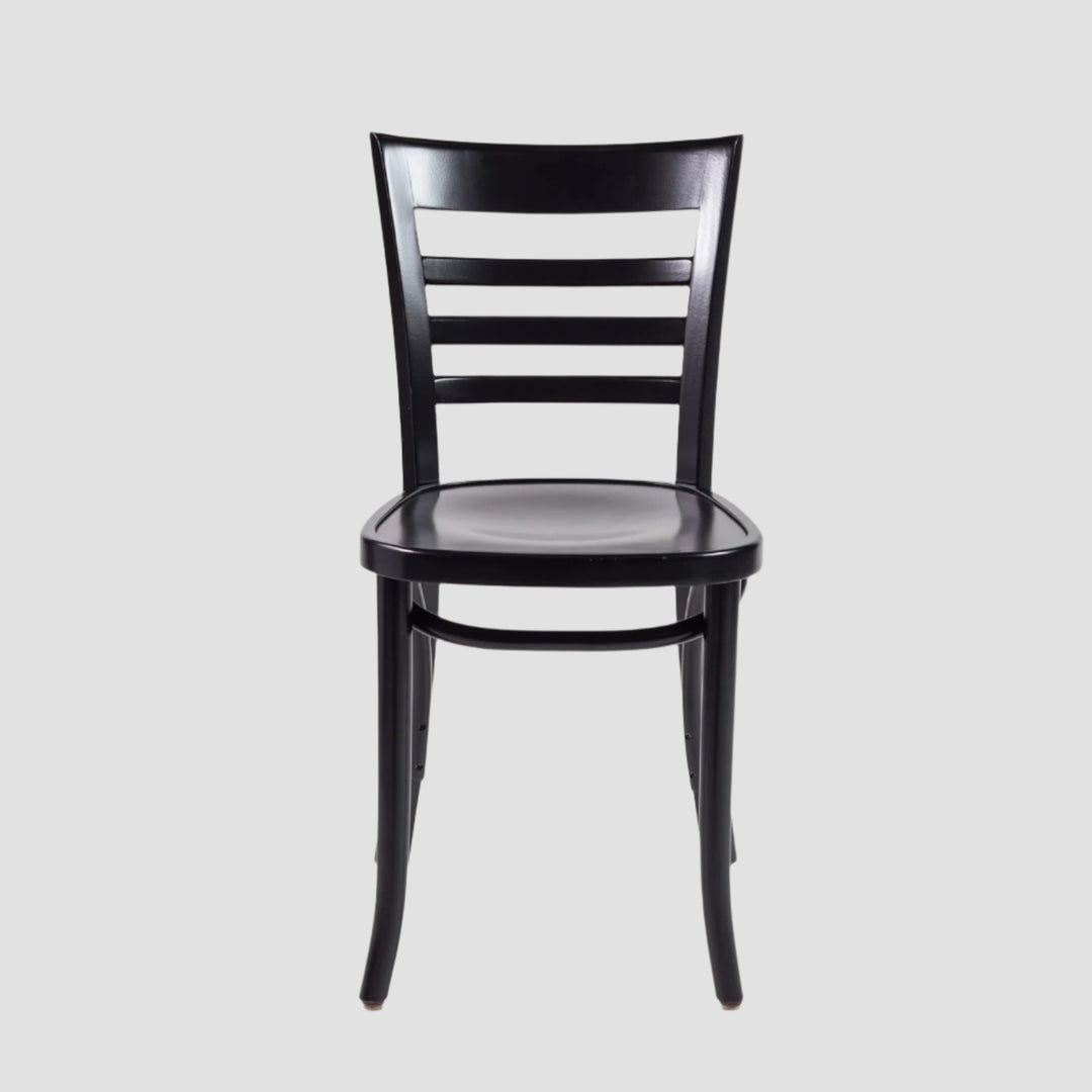 Front view of a black wooden chair with slatted backrest
