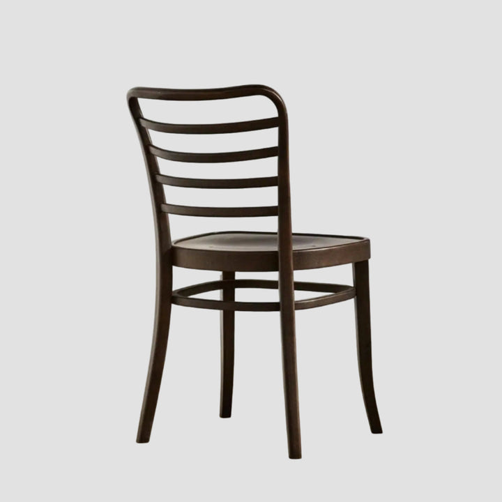 Dark brown wooden chair with slatted backrest on a neutral background