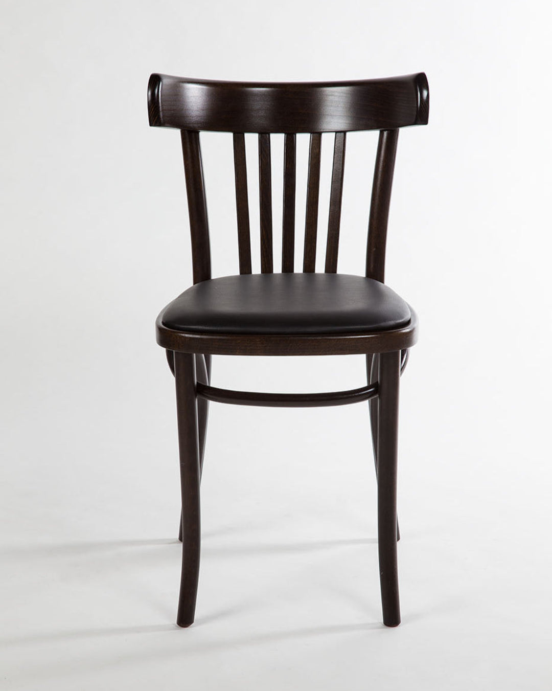 Dark wooden chair with a leather seat pad on a light grey background background